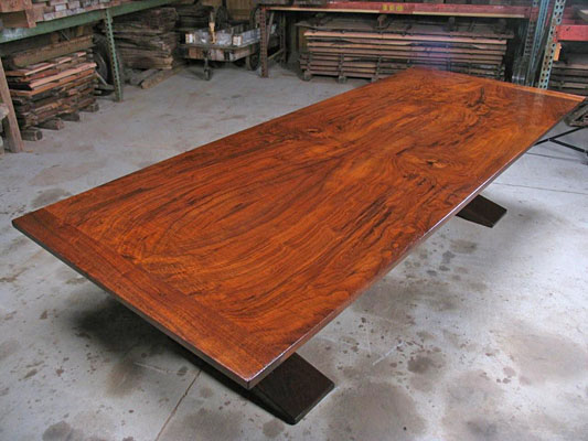 PEDESTAL/ TRESTLE DINING TABLE, BLACK AND CLARO WALNUT, 48" X 120" BOOK MATCHED TOP, AGED FINISH  (T119)